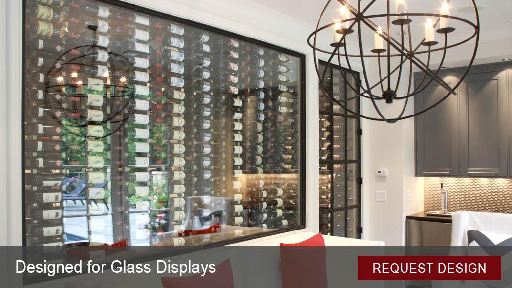 Glass enclosed modern wine cellar design. Thousands of serious wine collectors choose IWA for their custom designs.