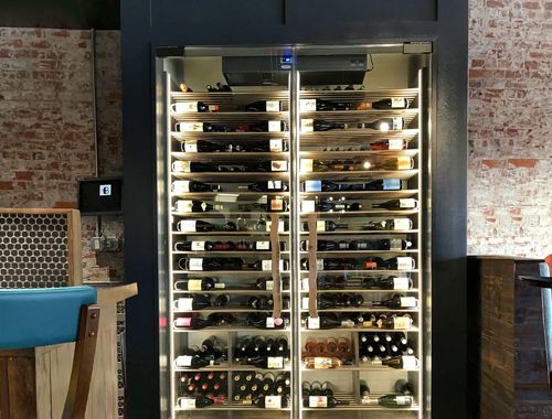 Custom Black Wine Cabinet in Restaurant