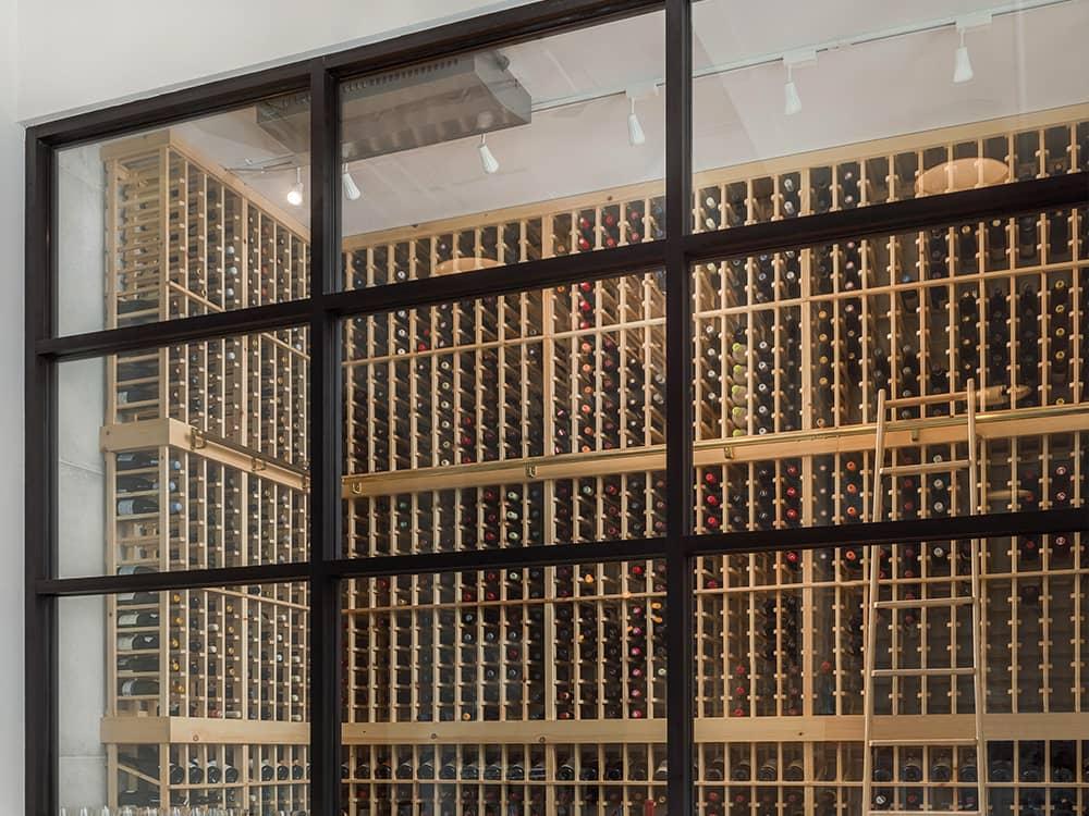 Glass Enclosed Wine Cellar with Cooling Unit in Ceiling