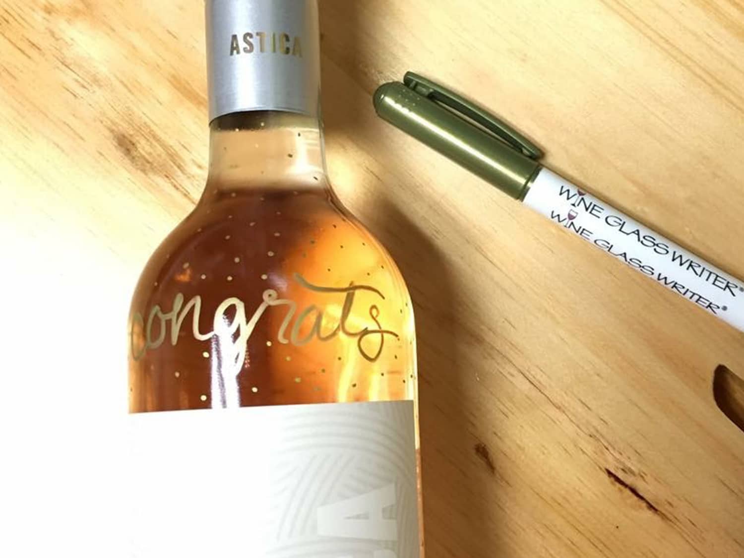Wine Glass Writer message on a wine bottle