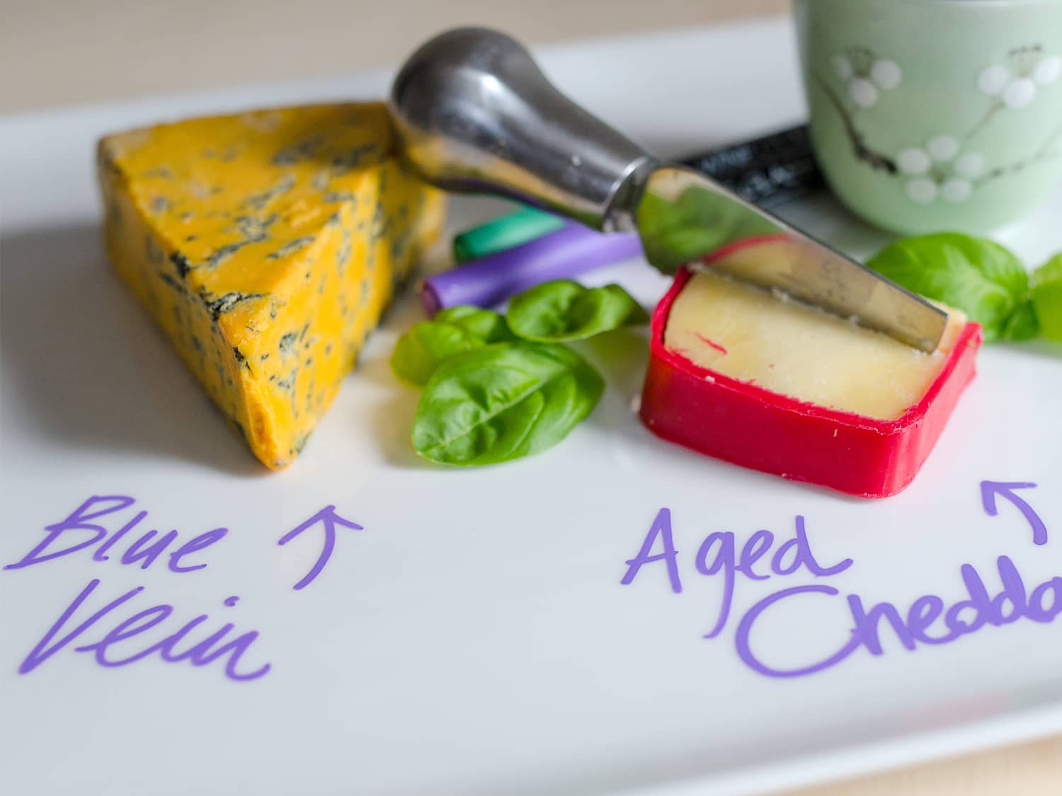 Wine Glass Writer pens on a cheese board