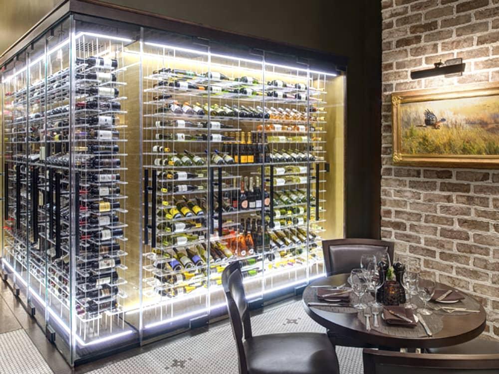 Glass enclosed, back lit wine cellar