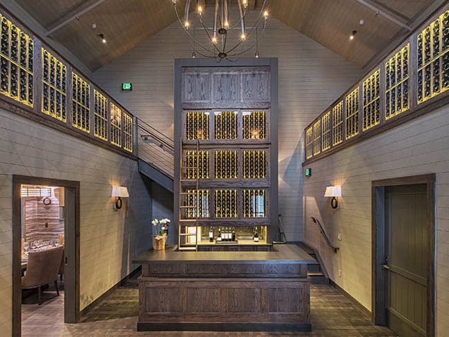 Multi-storied wine lockers and wine cabinets in a winery tasting room.
