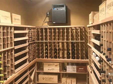 Custom wine room with classic wood wine racks.