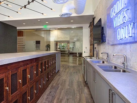 Row of custom wine lockers in a contemporary high-rise building.