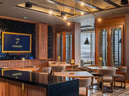 The Foundry restaurant with custom wood and glass wine cabinets.