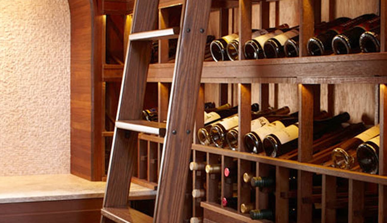 Custom wine racks with wood access ladder.
