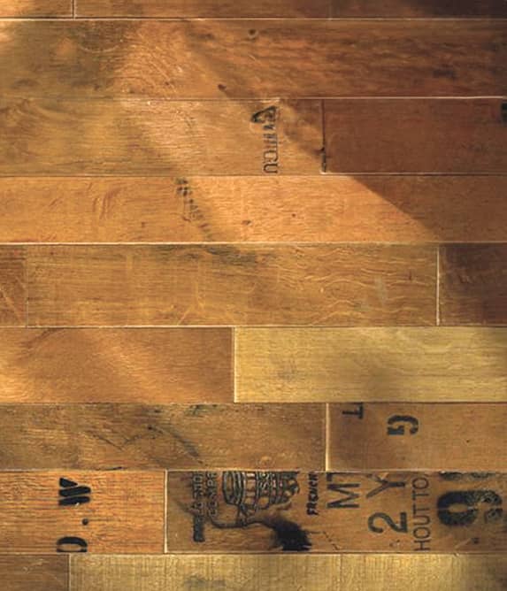 Rows of wood planks with winery markings on them