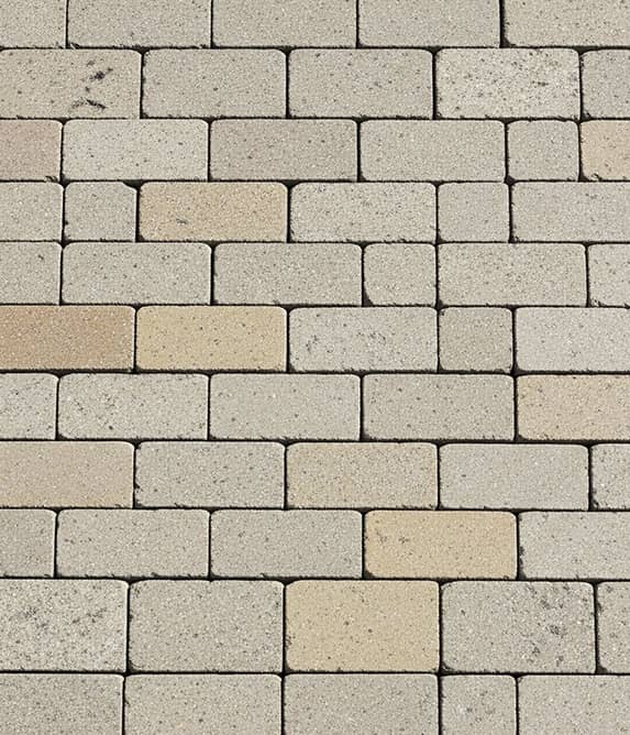Stone in regular brick sized blocks, in rows