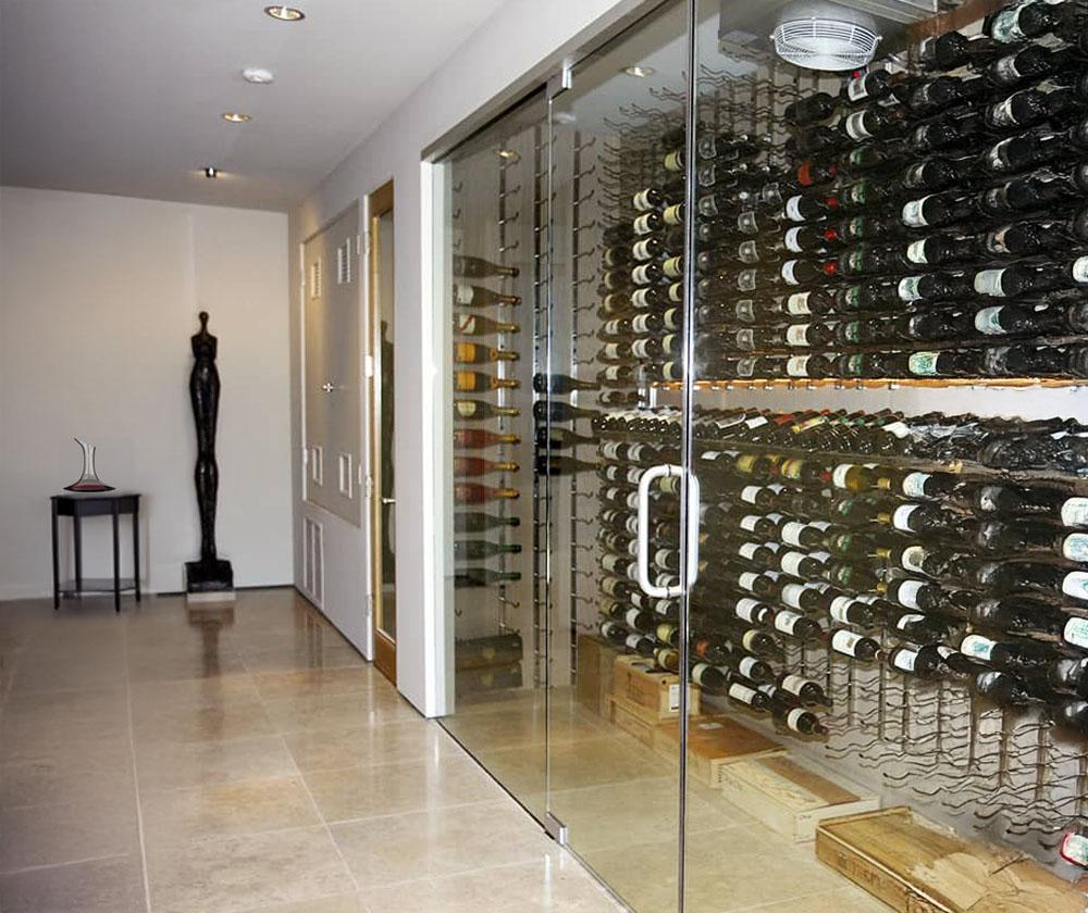 Glass enclosed wine cellar with glass doors
